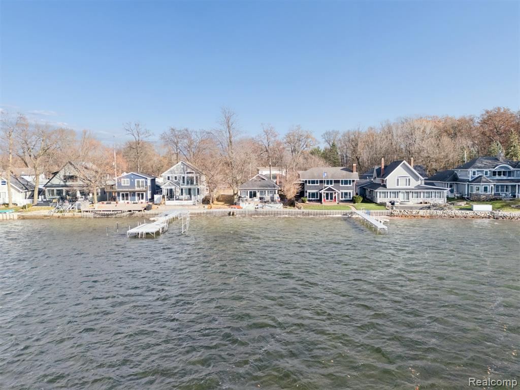 The shoreline and neighboring homes seen from the water