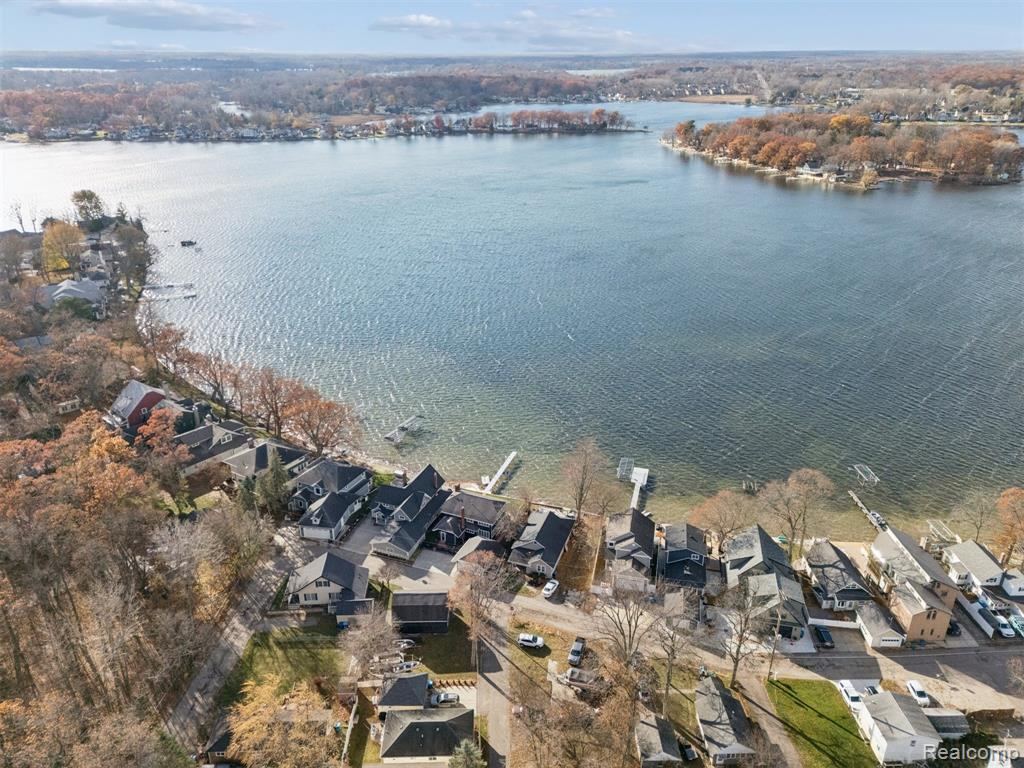 Aerial view of the property and Lake Fenton